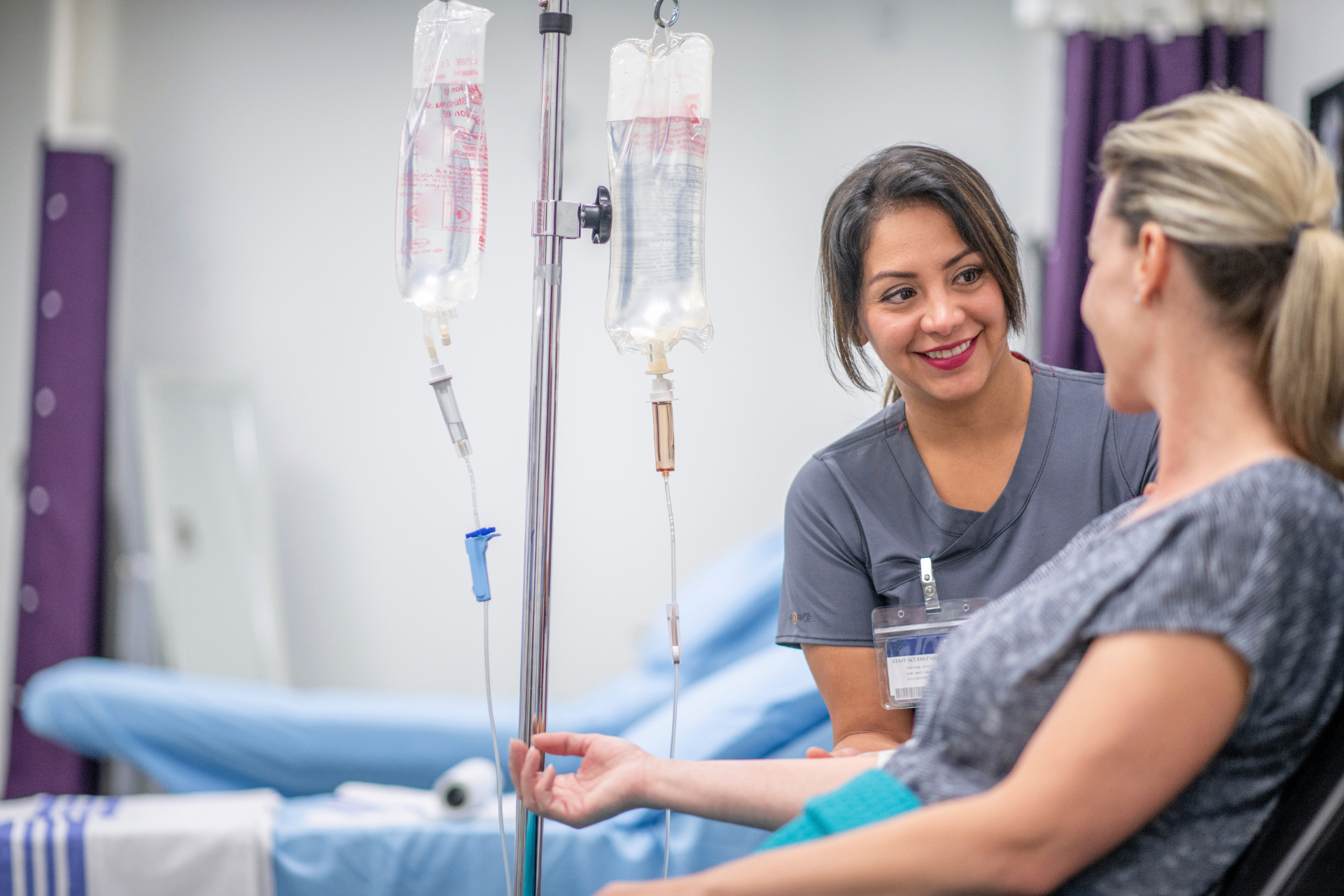 Registered Nurse with a guest during a stem cell IV infusion at iCRYO Marietta