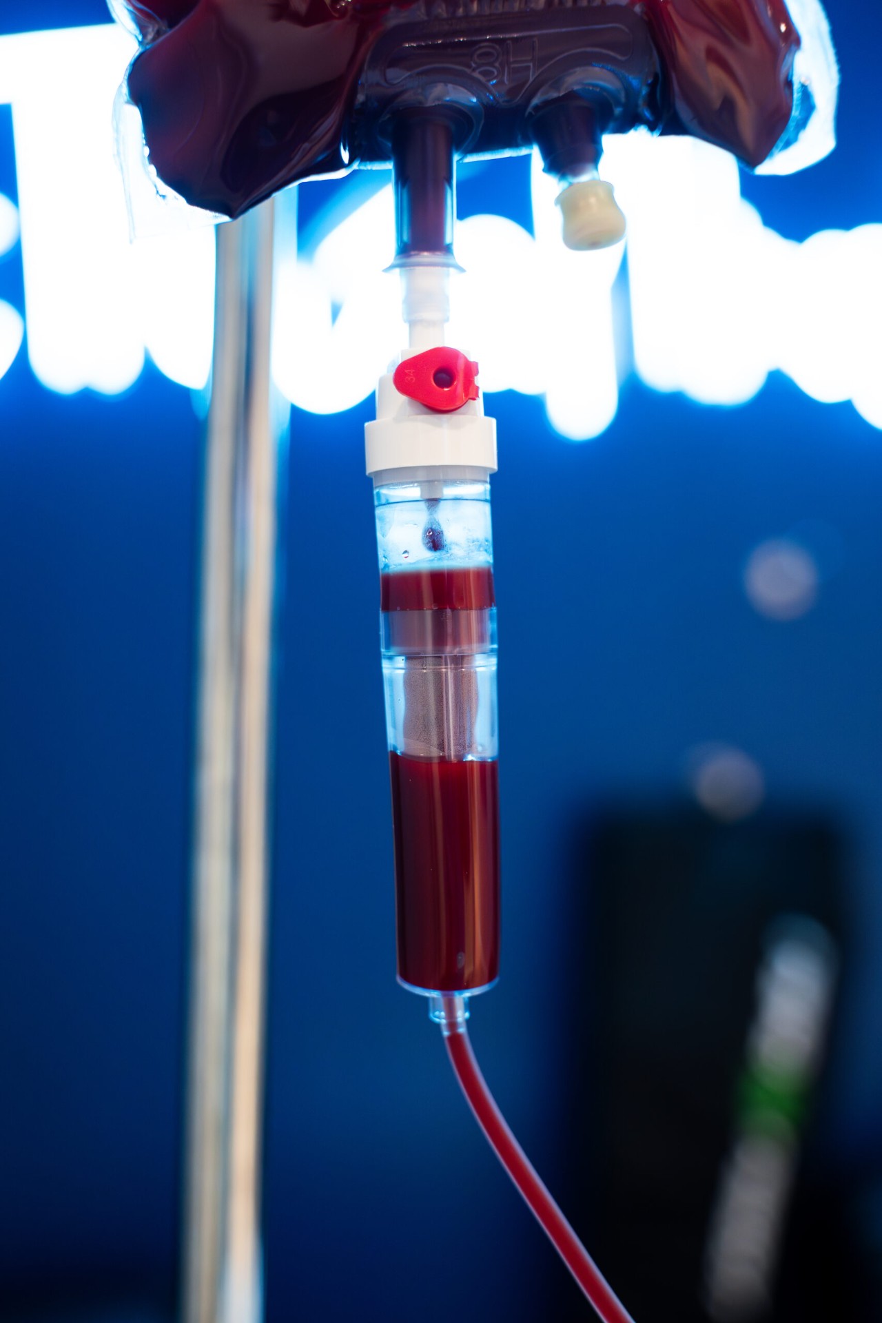 Ozone UV IV therapy filter glowing under UV light at iCRYO Marietta
